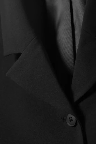 Blazer entallado de botonadura simple – Negro