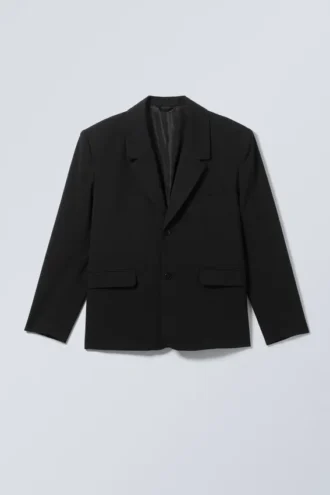 Blazer entallado de corte holgado y botonadura simple – Negro