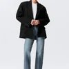 Blazer holgado de doble botonadura en mezcla de lino – Negro