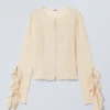 Blusa de manga larga con volantes – Beige Blusa de manga larga con volantes – Beige