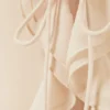 Blusa de manga larga con volantes – Beige Blusa de manga larga con volantes – Beige