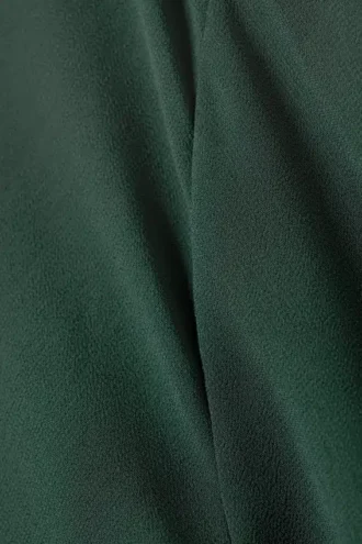 Blusa transparente asimétrica de manga larga – Petróleo