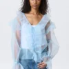 Blusa transparente con cuello en V y volantes – Azul claro