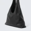 Bolso bandolera holgado de imitación de piel – Negro