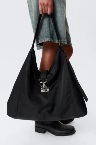 Bolso bandolera mediano con cierre y forma holgada – Negro