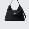 Bolso bandolera mediano con cierre y forma holgada – Negro Bolso bandolera mediano con cierre y forma holgada – Negro