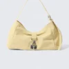 Bolso bandolera pequeño con cierre y forma holgada – Amarillo claro