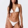 Braguita tanga de bikini con lazos de concha – Blanca Braguita tanga de bikini con lazos de concha – Blanca