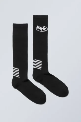 Calcetines deportivos con estampados hasta la rodilla – Negro