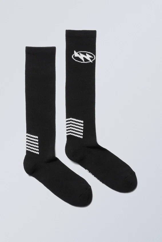 Calcetines deportivos con estampados hasta la rodilla – Negro Calcetines deportivos con estampados hasta la rodilla – Negro