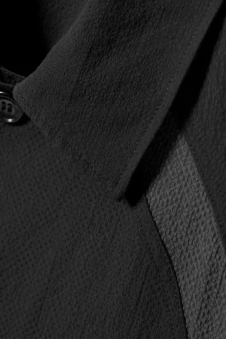 Camisa oversize de corte holgado con paneles y mangas raglán – Negro