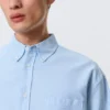 Camisa Oxford de corte recto y manga larga – Azul claro Camisa Oxford de corte recto y manga larga – Azul claro