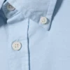 Camisa Oxford de corte recto y manga larga – Azul claro Camisa Oxford de corte recto y manga larga – Azul claro