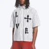 Camisas con estampados de corte recto y manga corta – Rayas blancas y negras Camisas con estampados de corte recto y manga corta – Rayas blancas y negras