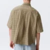Camisas de corte recto y manga corta – Beige a cuadros Camisas de corte recto y manga corta – Beige a cuadros