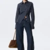 Camisas entalladas asimétricas de popelín – Rayas azul oscuro Camisas entalladas asimétricas de popelín – Rayas azul oscuro