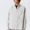 Camisas holgadas con botones y estructura – A cuadros grises Camisas holgadas con botones y estructura – A cuadros grises