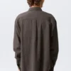 Camisas holgadas con estructura y botones – A cuadros marrón oscuro Camisas holgadas con estructura y botones – A cuadros marrón oscuro
