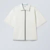Camisas holgadas de denim de pantalones cortos con cremallera – Azul moteado