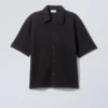 Camisas holgadas de manga corta con estructura – Negro Camisas holgadas de manga corta con estructura – Negro