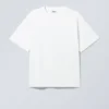 Camiseta con estampados de corte recto – Blanca – Símbolo verde Camiseta con estampados de corte recto – Blanca – Símbolo verde