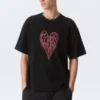 Camiseta con estampados de corte recto – Negro – Heart of Energy Camiseta con estampados de corte recto – Negro – Heart of Energy
