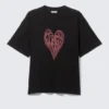 Camiseta con estampados de corte recto – Negro – Heart of Energy Camiseta con estampados de corte recto – Negro – Heart of Energy