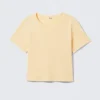 Camiseta corta ajustada de algodón – Amarillo claro