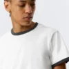Camiseta de algodón de manga corta con ribetes en contraste – Blanca – Ribete negro Camiseta de algodón de manga corta con ribetes en contraste – Blanca – Ribete negro