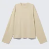 Camiseta de algodón de manga larga y corte recto – Beige claro Camiseta de algodón de manga larga y corte recto – Beige claro