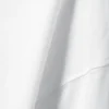 Camiseta de algodón de manga larga y corte recto – Blanca Camiseta de algodón de manga larga y corte recto – Blanca