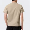 Camiseta de corte clásico – Beige claro Camiseta de corte clásico – Beige claro