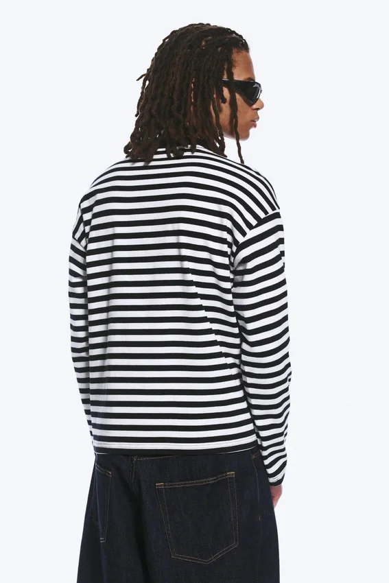 Camiseta de manga larga con estampados gráficos y corte holgado – Rayas blancas y negras – Dreams Camiseta de manga larga con estampados gráficos y corte holgado – Rayas blancas y negras – Dreams