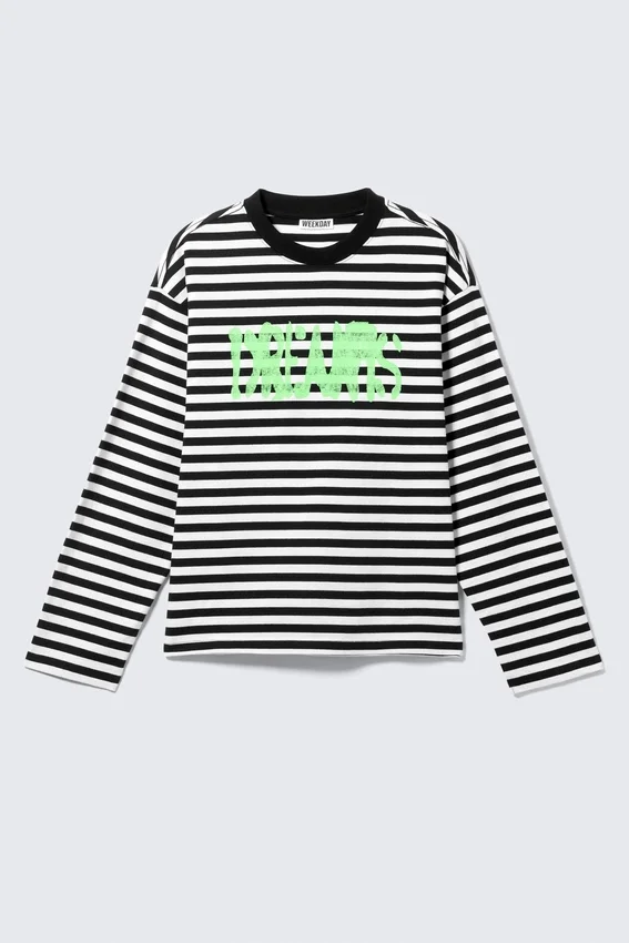 Camiseta de manga larga con estampados gráficos y corte holgado – Rayas blancas y negras – Dreams Camiseta de manga larga con estampados gráficos y corte holgado – Rayas blancas y negras – Dreams