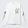 Camiseta de manga larga con estampados gráficos y corte recto – Blanca – Estampado abstracto Camiseta de manga larga con estampados gráficos y corte recto – Blanca – Estampado abstracto