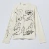 Camiseta de manga larga con estampados gráficos y corte recto – Blanco apagado – Shaky Monster Camiseta de manga larga con estampados gráficos y corte recto – Blanco apagado – Shaky Monster