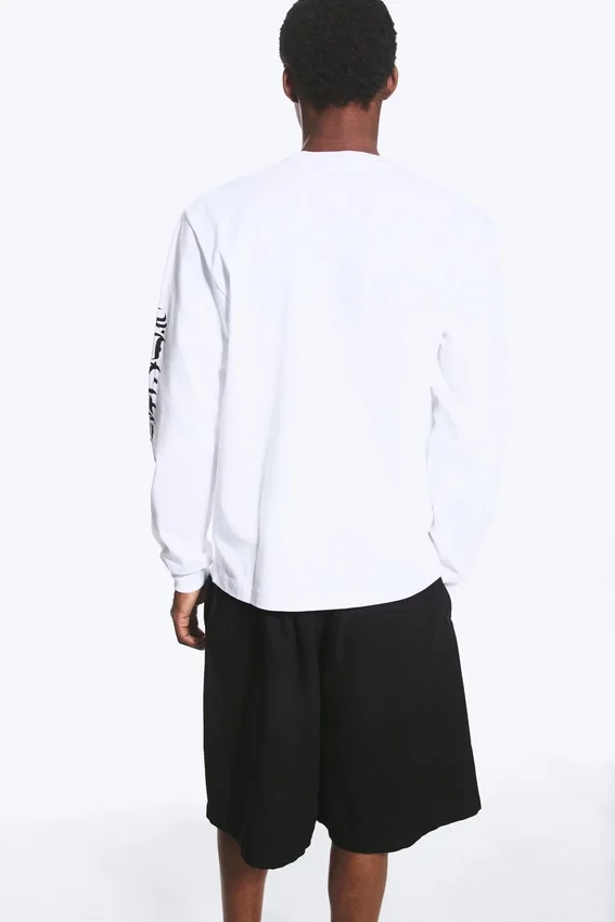 Camiseta de manga larga con estampados relajados – Blanca – Synergy Camiseta de manga larga con estampados relajados – Blanca – Synergy