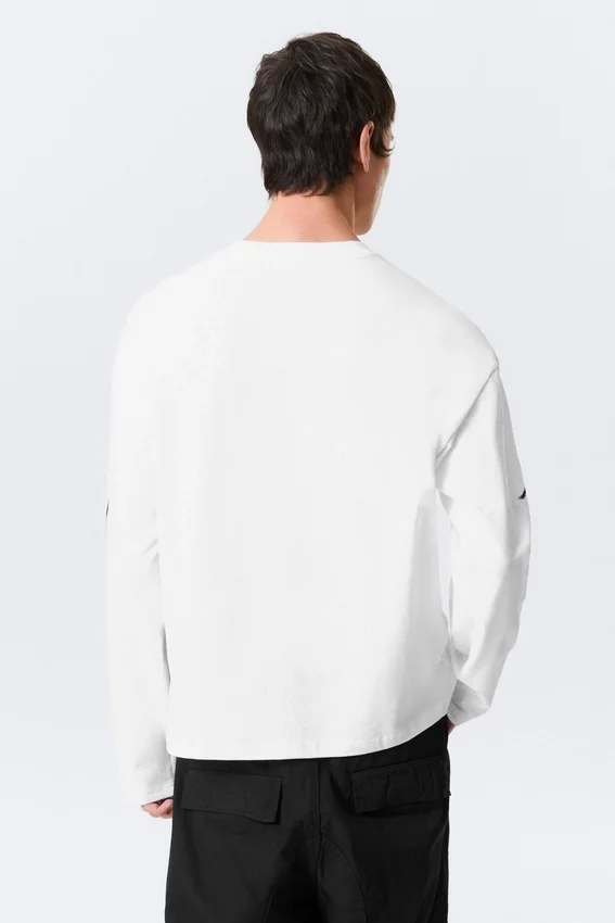 Camiseta de manga larga con estampados y corte holgado – Blanca – Airways Camiseta de manga larga con estampados y corte holgado – Blanca – Airways