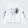 Camiseta de manga larga con estampados y corte holgado – Blanca – Airways Camiseta de manga larga con estampados y corte holgado – Blanca – Airways