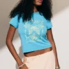 Camiseta estampada para bebé Rosabel – Turquesa – Mariposa Camiseta estampada para bebé Rosabel – Turquesa – Mariposa