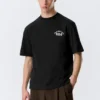 Camiseta holgada con estampados – Negro – Team Building Camiseta holgada con estampados – Negro – Team Building