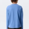 Camiseta holgada de manga larga – Azul lavado Camiseta holgada de manga larga – Azul lavado