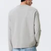 Camiseta holgada de manga larga – Beige claro Camiseta holgada de manga larga – Beige claro