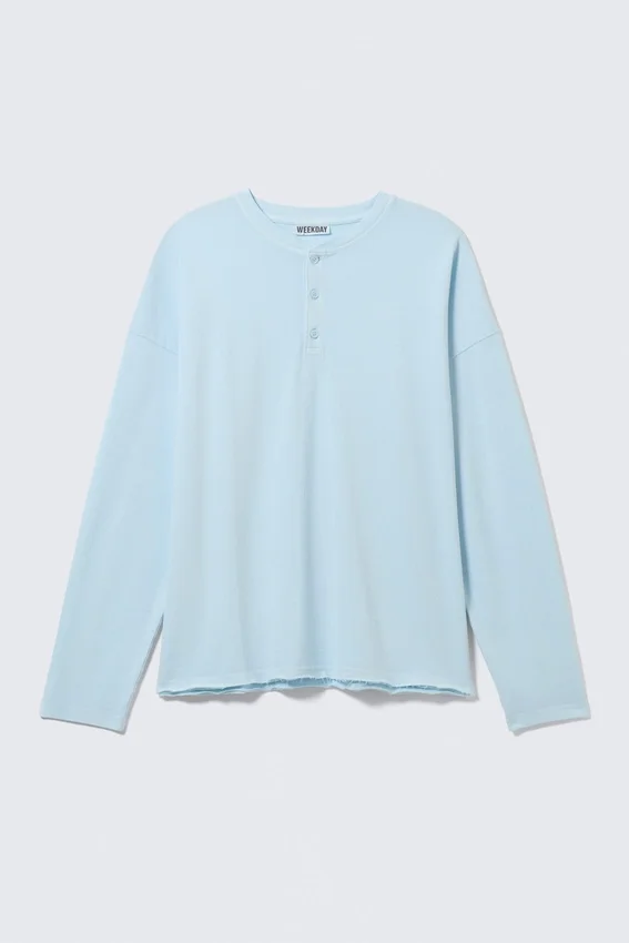 Camiseta holgada de manga larga con cuello Henley – Azul claro Camiseta holgada de manga larga con cuello Henley – Azul claro
