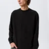 Camiseta holgada de manga larga – Negro Camiseta holgada de manga larga – Negro