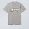 Camiseta oversize con estampados – Banda metálica puntiaguda Camiseta oversize con estampados – Banda metálica puntiaguda