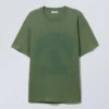 Camiseta oversize con estampados – Verde oscuro lavado