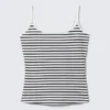Camiseta sin mangas ajustada con tirantes y cuello redondo – Rayas blancas y negras Camiseta sin mangas ajustada con tirantes y cuello redondo – Rayas blancas y negras