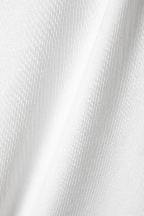 Camiseta sin mangas ajustada de algodón – Blanca Camiseta sin mangas ajustada de algodón – Blanca