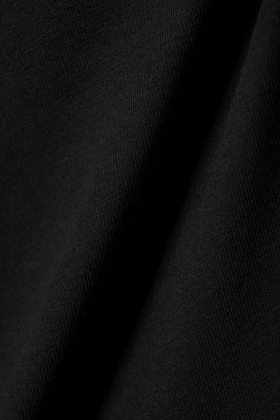 Camiseta sin mangas ajustada de algodón – Negro Camiseta sin mangas ajustada de algodón – Negro